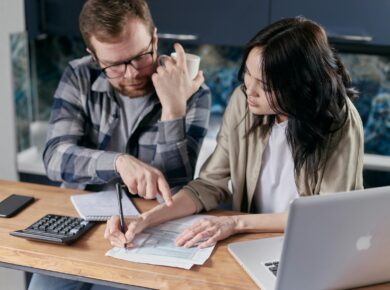 Free couple calculating al their bills stock photo