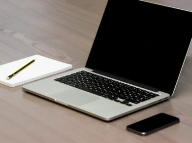 Free Silver Macbook Beside Iphone Stock Photo